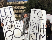 John Erler '89 protesting a bathroom bill dressed as Moses